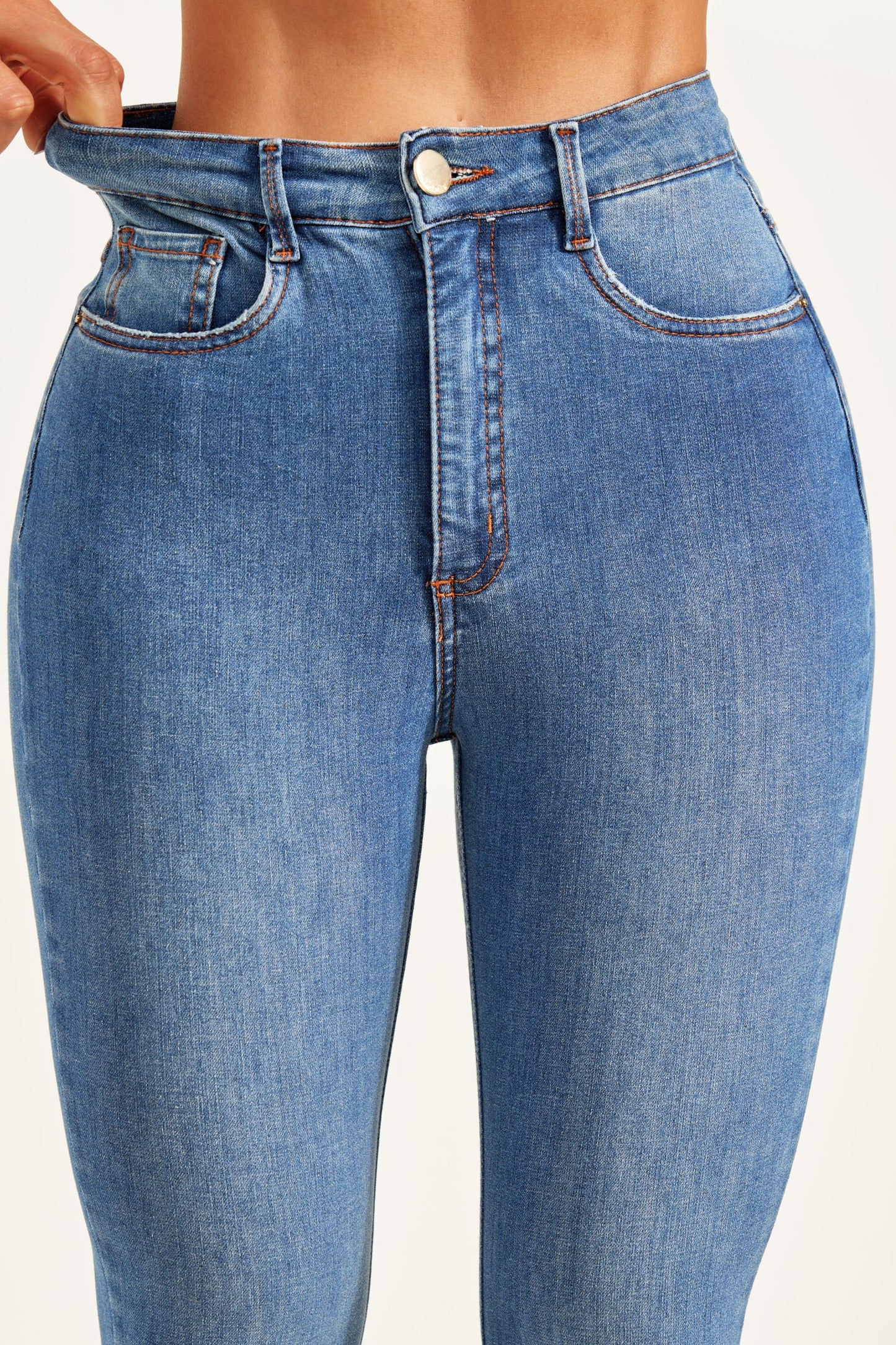 Calça Jeans Modeladora Revolucionária Flare Cós Médio