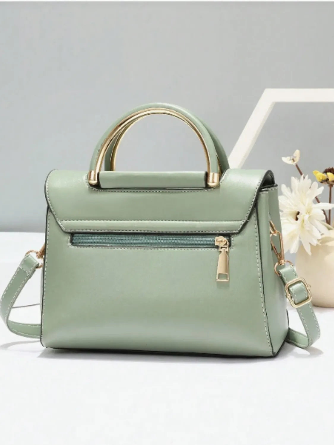 Bolsa Tiracolo Quadrada com Alça de Metal e Detalhes Trançados - July